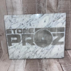Stone Proz logo in granite handcrafted by Triple R Designs